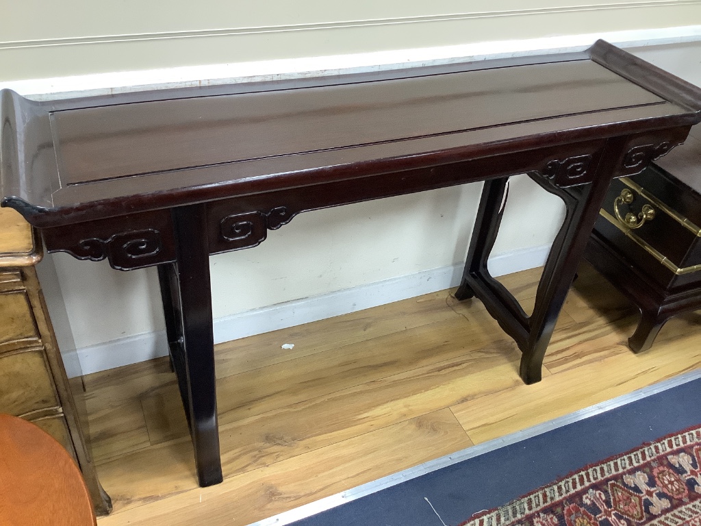 A 20th century Chinese hardwood altar table, width 150cm depth 40cm height 86cm